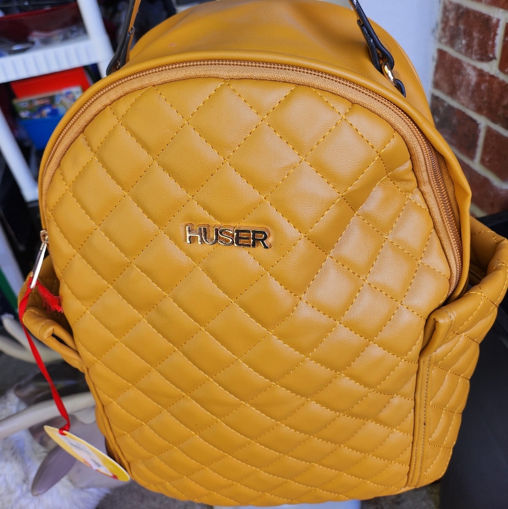 LEATHER BACKPACK BY HUSER